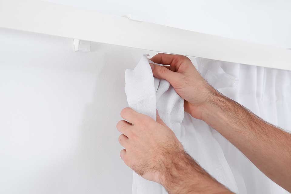 Curtain track. For curtains with a heading tape.